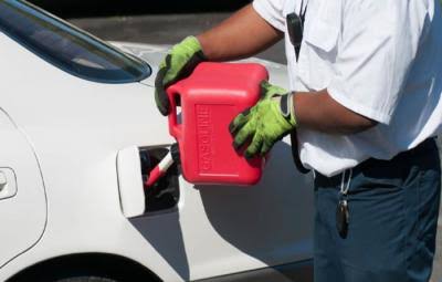 Roadside fuel delivery to a vehicle