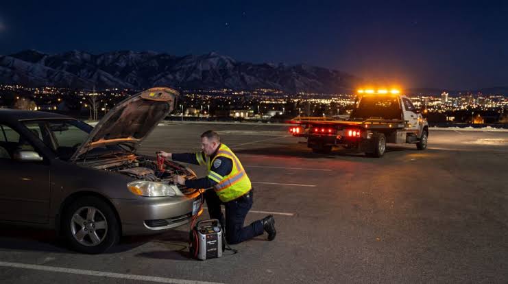 Vehicle battery jumpstart with jumper cables